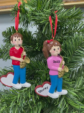 Load and play video in Gallery viewer, Personalized Christmas Ornament Saxophone Girl/Boy
